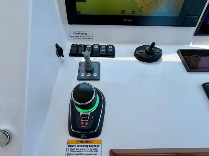 Waterlee Yacht Photos Pics Control panel of a 2019 MJM 35z boat with navigation and joystick controls.