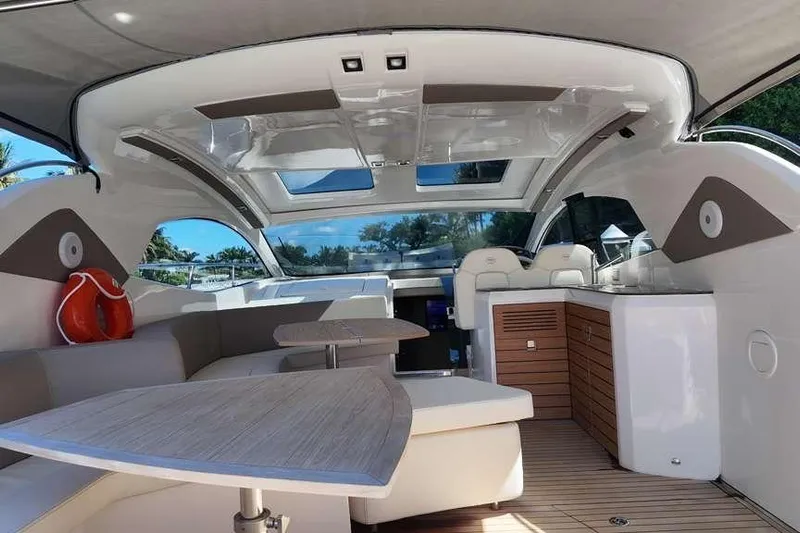  Yacht Photos Pics 2024 Sessa Marine C44 Cruiser interior with modern seating and sleek design.