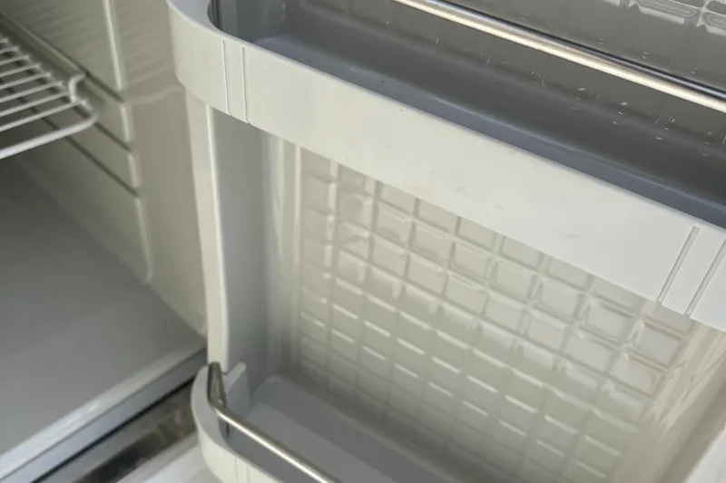  Yacht Photos Pics Close-up of storage compartment in 2015 Hunt Yachts Harrier Sport.