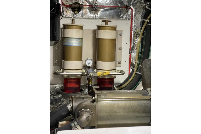 Moore Fun Yacht Photos Pics Engine room of 1998 Ocean Alexander 486 Classico Pilothouse with dual fuel filters.