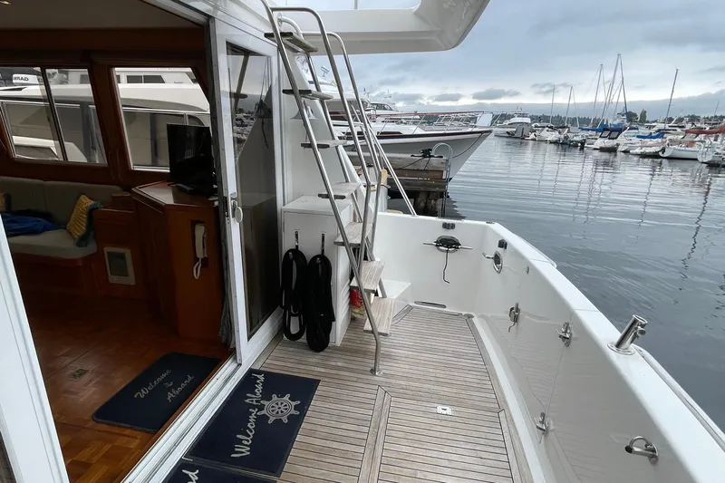 Moore Fun Yacht Photos Pics 1998 Ocean Alexander 486 Classico Pilothouse yacht docked, featuring elegant interior and marina view.