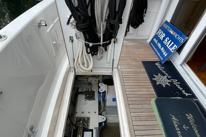 Moore Fun Yacht Photos Pics 1998 Ocean Alexander 486 Classico Pilothouse yacht for sale, deck view with ropes and engine access.