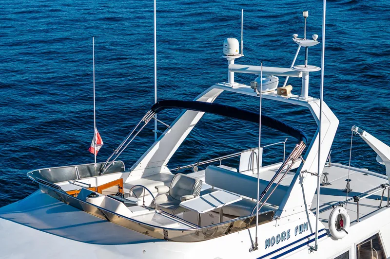 Moore Fun Yacht Photos Pics 1998 Ocean Alexander 486 Classico Pilothouse yacht on blue ocean waters.