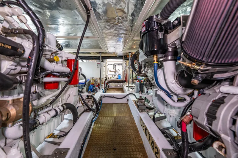 Moore Fun Yacht Photos Pics Engine room of 1998 Ocean Alexander 486 Classico Pilothouse, showcasing mechanical components.
