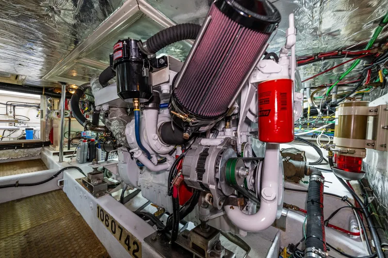 Moore Fun Yacht Photos Pics Engine room of 1998 Ocean Alexander 486 Classico Pilothouse, showcasing detailed machinery and components.