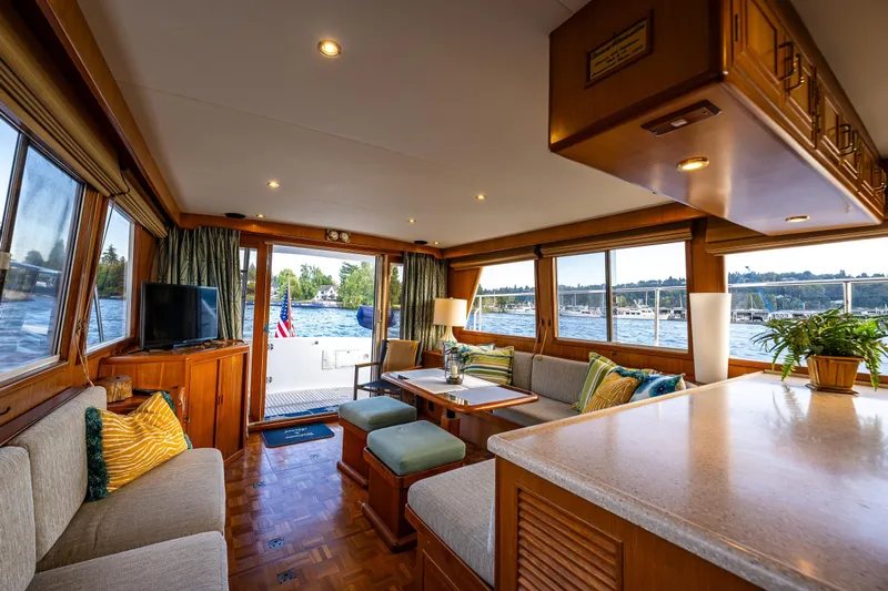 Moore Fun Yacht Photos Pics Luxurious interior of 1998 Ocean Alexander 486 Classico Pilothouse yacht with scenic water views.