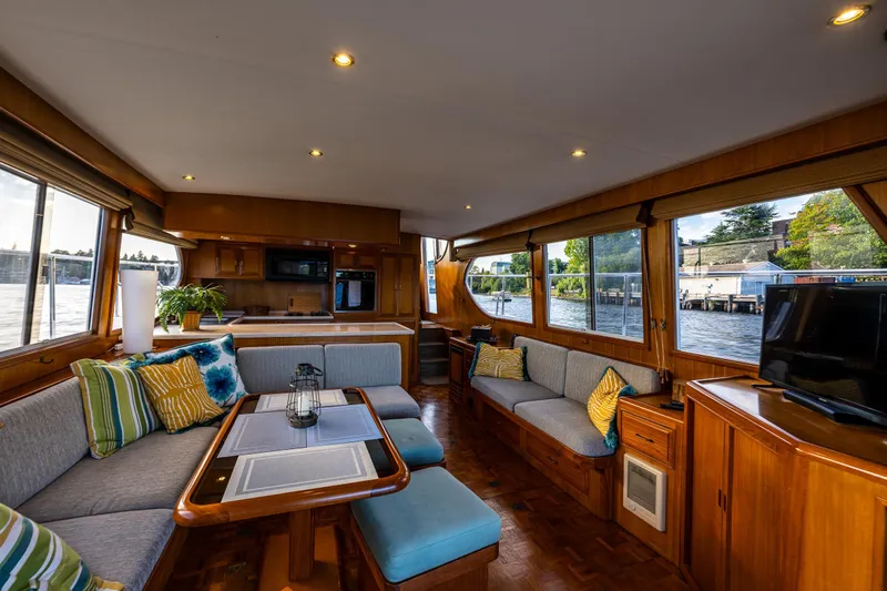 Moore Fun Yacht Photos Pics Luxurious 1998 Ocean Alexander 486 Classico Pilothouse interior with elegant seating and large windows.