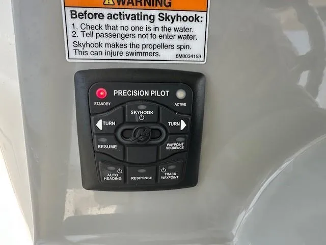 Boston Whaler 330 Outrage Yacht Photos Pics Control panel of a 2016 Boston Whaler 330 Outrage boat with Skyhook feature.