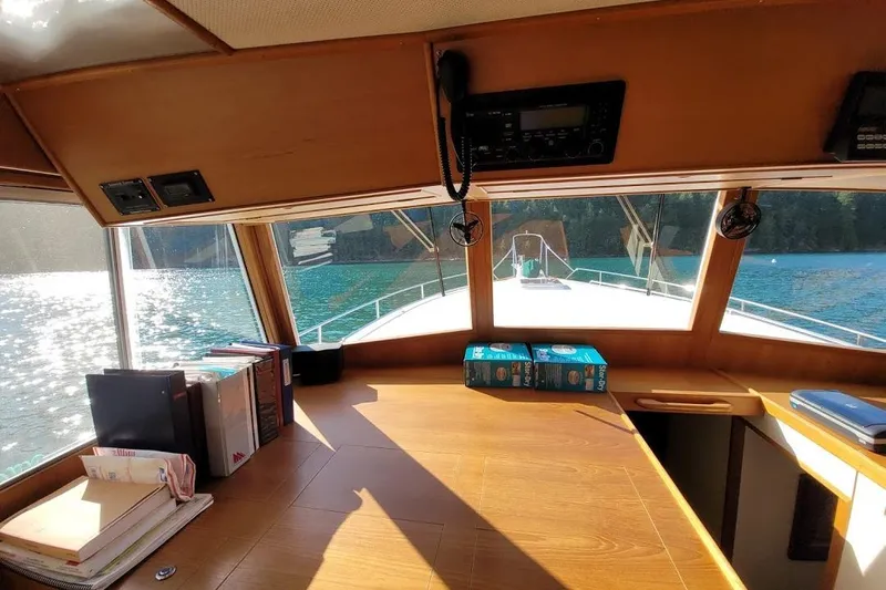 Goodlife Yacht Photos Pics Interior view of 1998 Grand Banks 46 Europa yacht with scenic water backdrop.