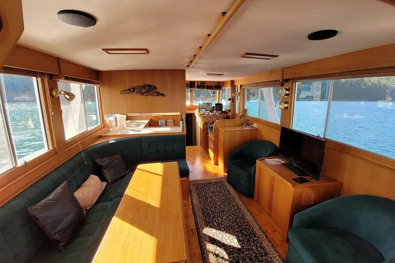 Goodlife Yacht Photos Pics Interior of 1998 Grand Banks 46 Europa yacht with elegant wood finish and scenic water views.