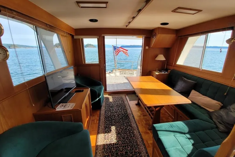 Goodlife Yacht Photos Pics Interior of 1998 Grand Banks 46 Europa yacht with cozy seating and ocean view.