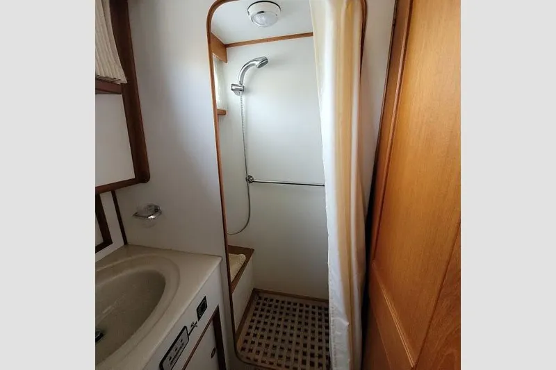 Goodlife Yacht Photos Pics 1998 Grand Banks 46 Europa yacht bathroom with shower and sink.