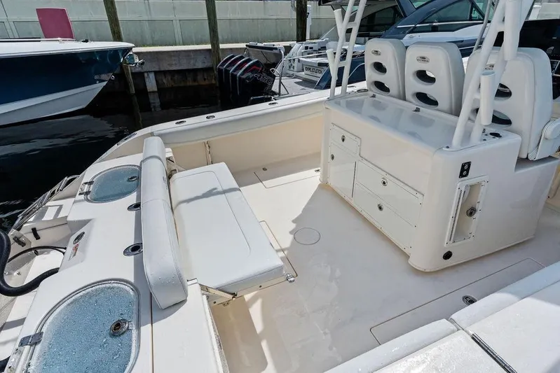  Yacht Photos Pics 2021 Cobia 350 Center Console boat interior with seating and storage compartments.
