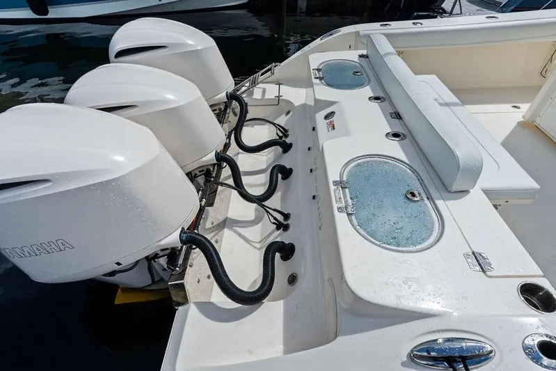  Yacht Photos Pics 2021 Cobia 350 Center Console boat with triple Yamaha engines and spacious seating.