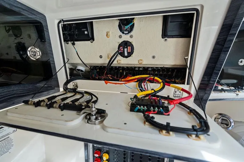  Yacht Photos Pics 2021 Cobia 350 Center Console electrical panel with wiring and components.
