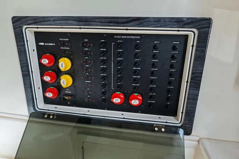  Yacht Photos Pics Electrical panel of 2021 Cobia 350 Center Console boat with switches and controls.