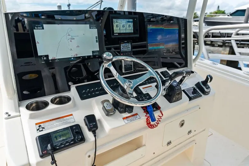  Yacht Photos Pics 2021 Cobia 350 Center Console helm with advanced navigation and control systems.