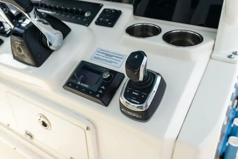  Yacht Photos Pics 2021 Cobia 350 Center Console boat controls with joystick and audio system.