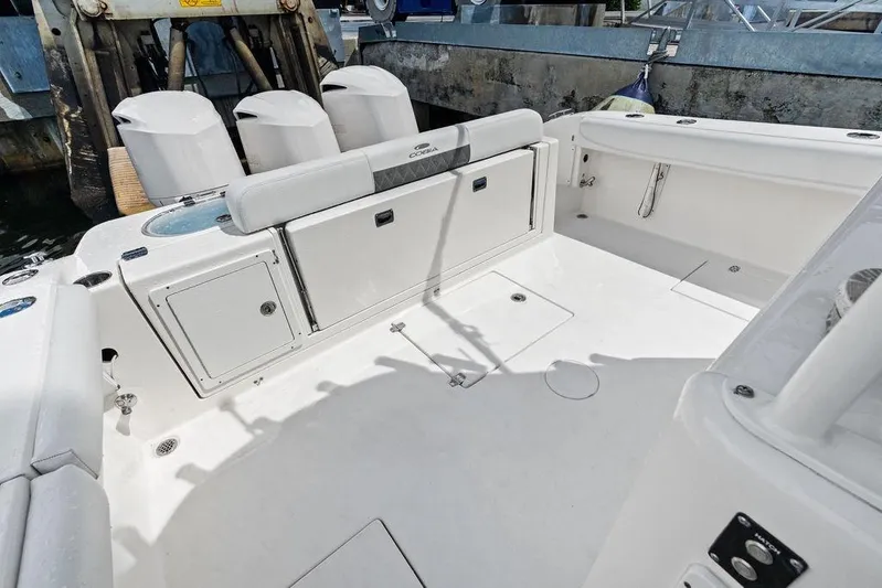  Yacht Photos Pics 2021 Cobia 350 Center Console boat interior with storage compartments and seating.