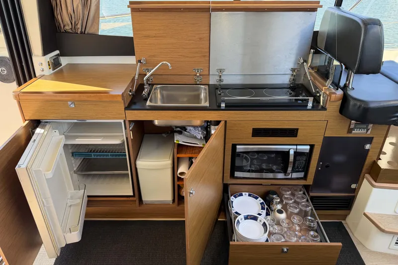 Requin Yacht Photos Pics 2019 Jeanneau NC 11 boat kitchen with stove, sink, fridge, and microwave&nbsp;&nbsp;for sale in Mexico by Servicios Nauticos and Gaston Troche