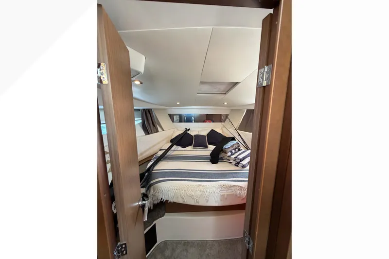 Requin Yacht Photos Pics Cozy Main cabin interior of 2019 Jeanneau NC 11 yacht with bed and cushions&nbsp;&nbsp;for sale in Mexico by Servicios Nauticos and Gaston Troche