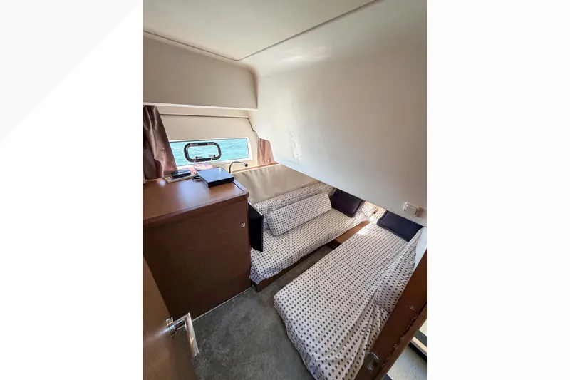 Requin Yacht Photos Pics 2019 Jeanneau NC 11 &nbsp;thirdcabin interior with twin beds and window view&nbsp;&nbsp;for sale in Mexico by Servicios Nauticos and Gaston Troche