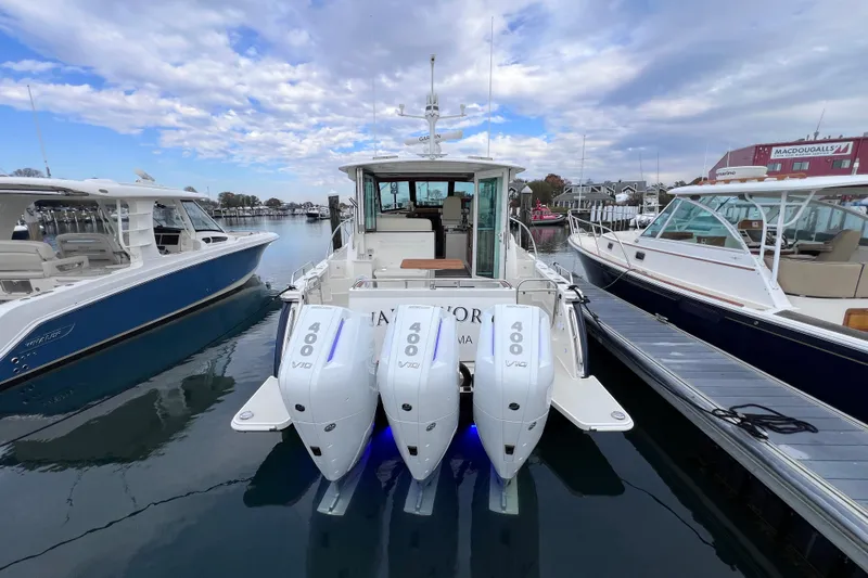 Wally World Yacht Photos Pics 2024 Back Cove 39O boat with triple 400 V10 engines docked at marina.