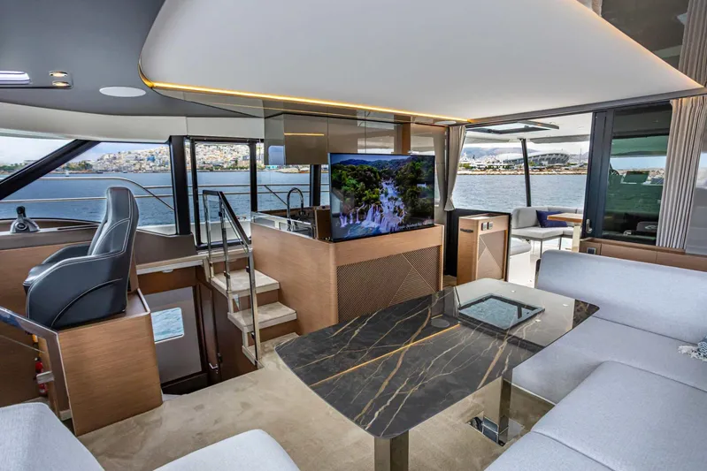  Yacht Photos Pics Luxurious interior of 2024 Prestige M48 yacht with modern furnishings and scenic views.