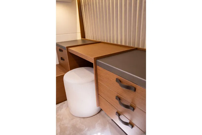  Yacht Photos Pics Modern wooden desk with drawers and a white stool, Prestige M48 2024 model.