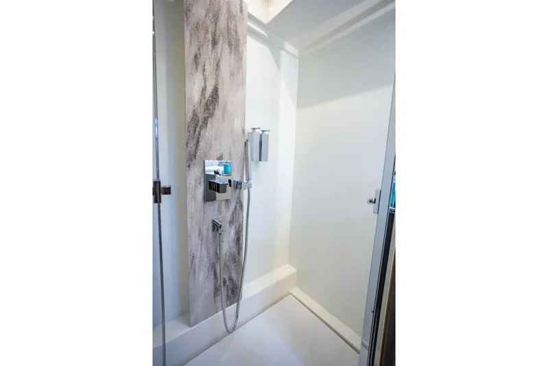  Yacht Photos Pics Modern shower in 2024 Prestige M48 yacht, featuring sleek design and chrome fixtures.
