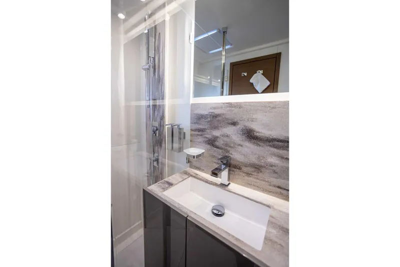  Yacht Photos Pics Modern bathroom in 2024 Prestige M48 yacht with sleek fixtures and elegant design.