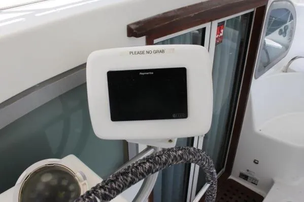 Jobsite Yacht Photos Pics 2006 Alliaura Marine Privilege 435 EZC yacht helm with navigation display.