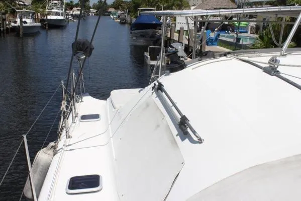 Jobsite Yacht Photos Pics 2006 Alliaura Marine Privilege 435 EZC catamaran docked in a serene marina.