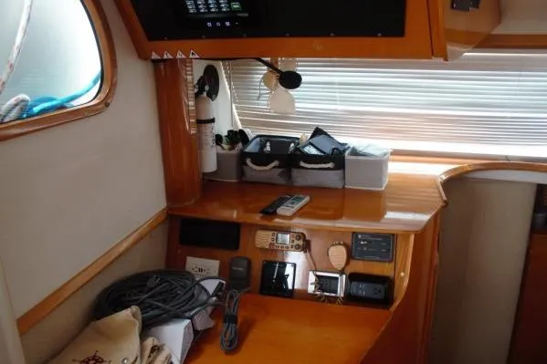 Jobsite Yacht Photos Pics 2006 Alliaura Marine Privilege 435 EZC yacht interior with navigation equipment and storage.