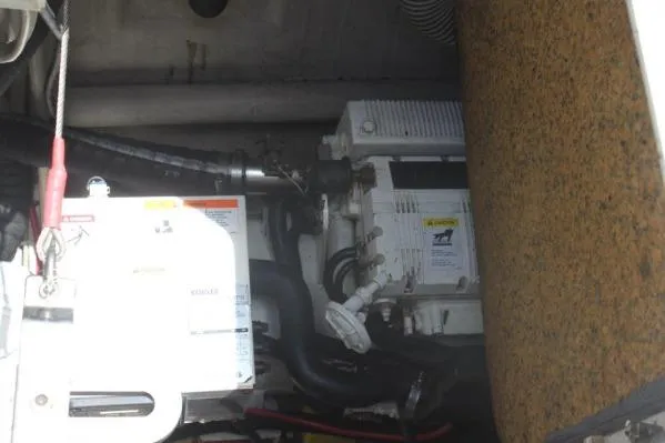 Jobsite Yacht Photos Pics Engine compartment of 2006 Alliaura Marine Privilege 435 EZC catamaran, showcasing mechanical components.