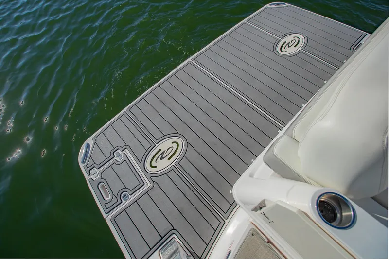  Yacht Photos Pics 2021 Regal 36 Grande Coupe swim platform on calm water.