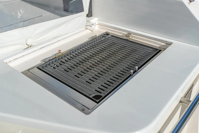  Yacht Photos Pics Outdoor grill on 2021 Regal 36 Grande Coupe yacht deck.