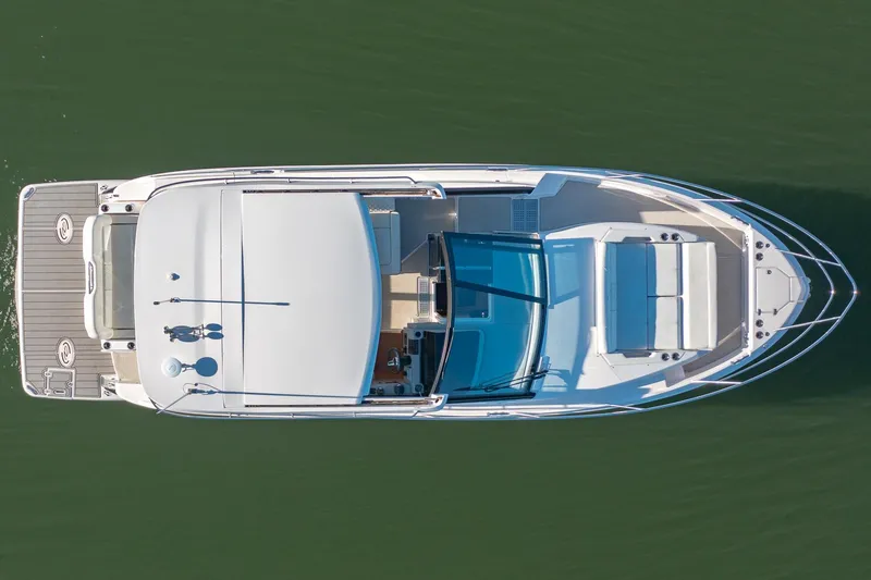  Yacht Photos Pics Aerial view of 2021 Regal 36 Grande Coupe luxury yacht on water.