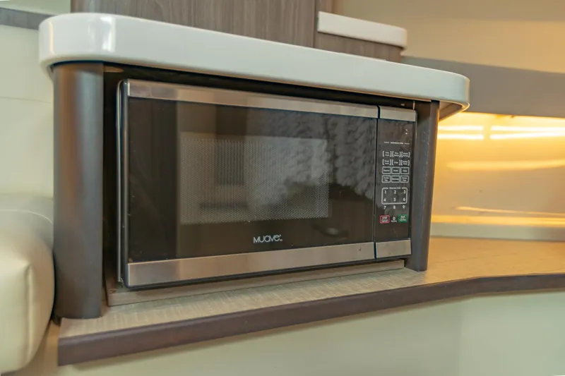 Yacht Photos Pics Microwave oven in 2021 Regal 36 Grande Coupe yacht interior kitchen.