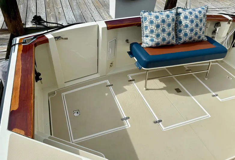 Gulf Kart Lll Yacht Photos Pics Interior of a 2003 Sabre 36 yacht with bench seating and cushions.
