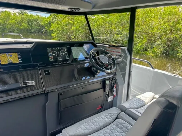  Yacht Photos Pics 2024 BRABUS Shadow 1000XC cockpit with advanced navigation system and luxurious seating.