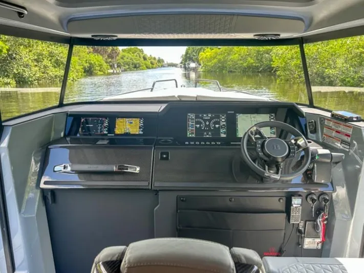  Yacht Photos Pics 2024 BRABUS Shadow 1000XC boat cockpit with advanced navigation system and sleek design.