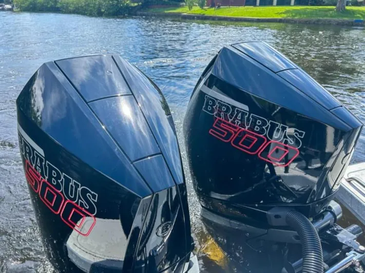  Yacht Photos Pics Twin BRABUS 500 outboard engines on 2024 Shadow 1000XC boat, cruising on water.
