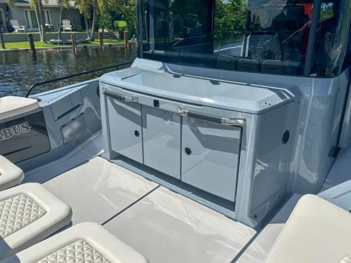  Yacht Photos Pics 2024 BRABUS Shadow 1000XC boat interior with sleek cabinetry and seating.