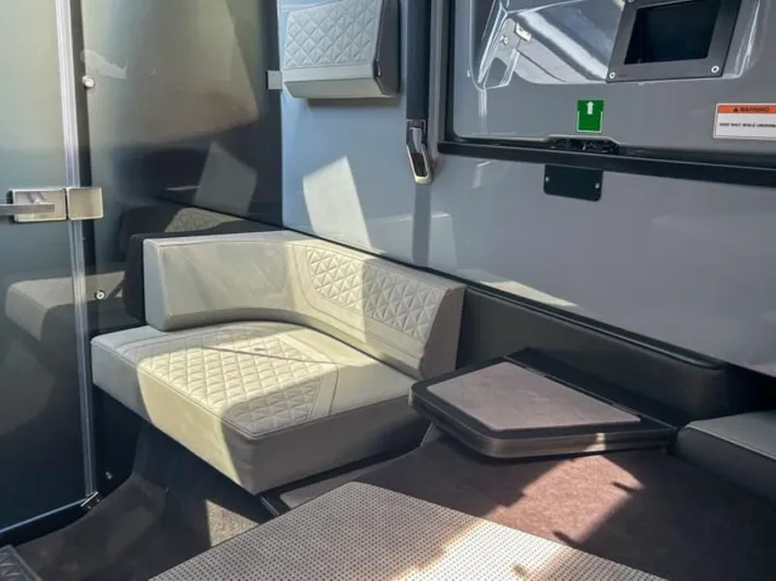  Yacht Photos Pics Interior of 2024 BRABUS Shadow 1000XC, featuring modern seating and sleek design elements.