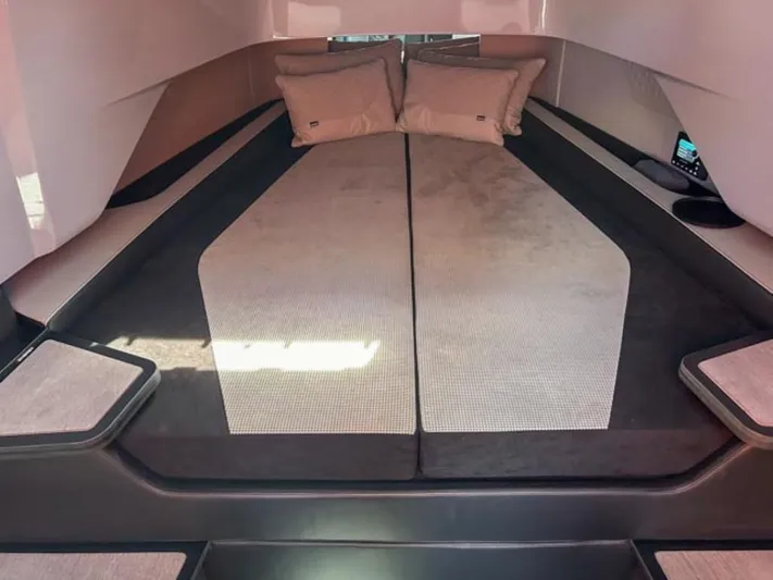  Yacht Photos Pics Luxurious interior of 2024 BRABUS Shadow 1000XC with plush bedding and modern design.