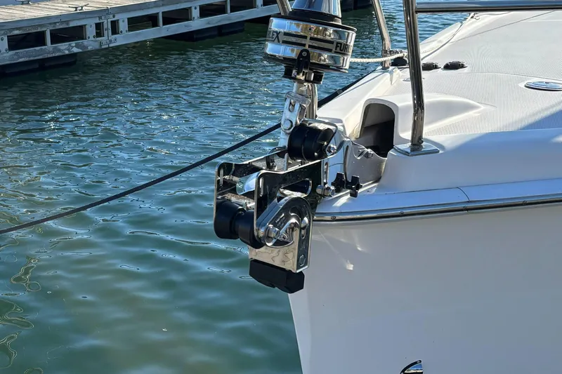 Antares Yacht Photos Pics 2011 Hunter 39 sailboat bow with anchor mechanism at marina dock.