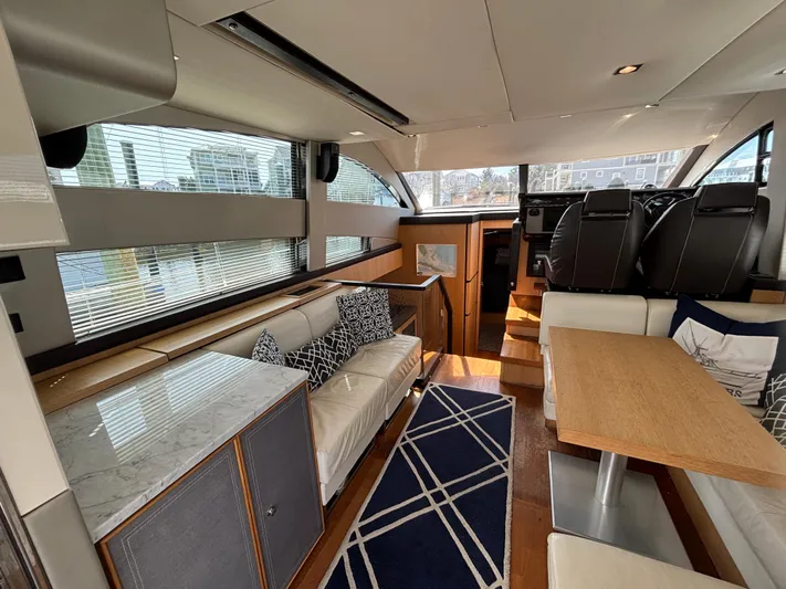 Sawbones Yacht Photos Pics Luxurious interior of 2015 Fairline Squadron 42 yacht with modern furnishings and elegant design.