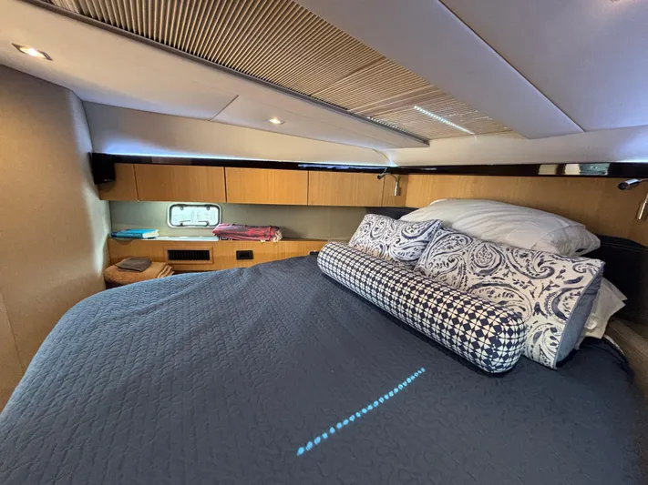 Sawbones Yacht Photos Pics Luxurious cabin interior of 2015 Fairline Squadron 42 yacht with elegant bedding.