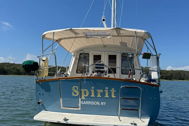 Spirit Yacht Photos Pics Cabo Rico Northeast 400 sailboat, 2001 model, named "Spirit" in serene waters.